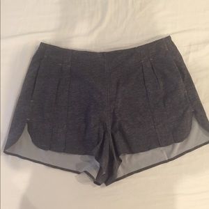 Two pairs Lululemon running shorts